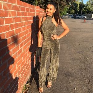 jlo gold and black jumpsuit 🤩